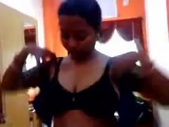 A cute, all-natural Indian playgirl with black hair dons a sari.